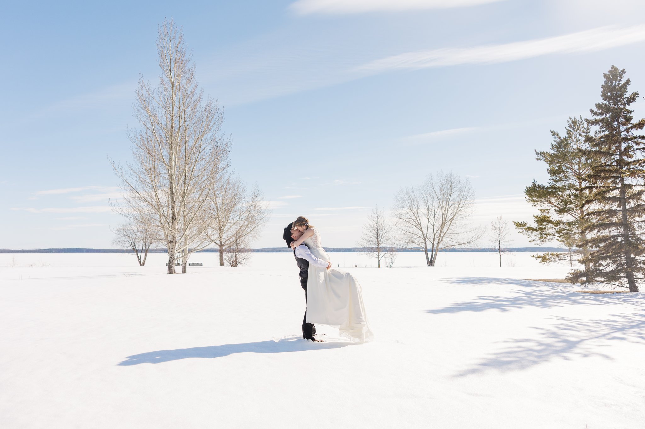Bride and groom at the vintage Gratton car, winter portrait