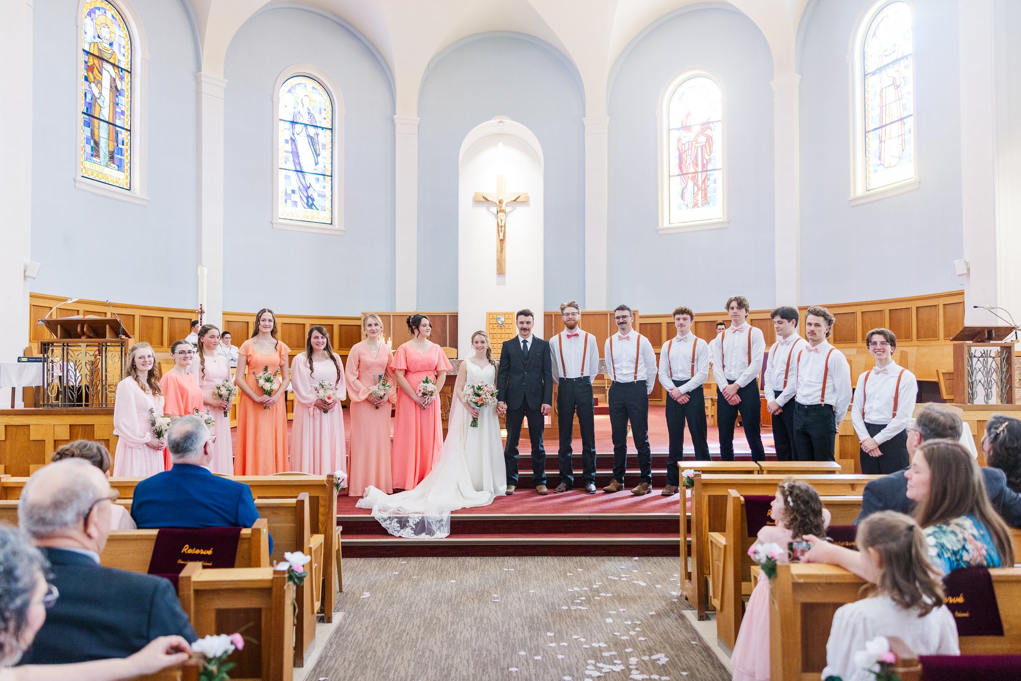 Bride and groom recessional, guests celebrating around them
