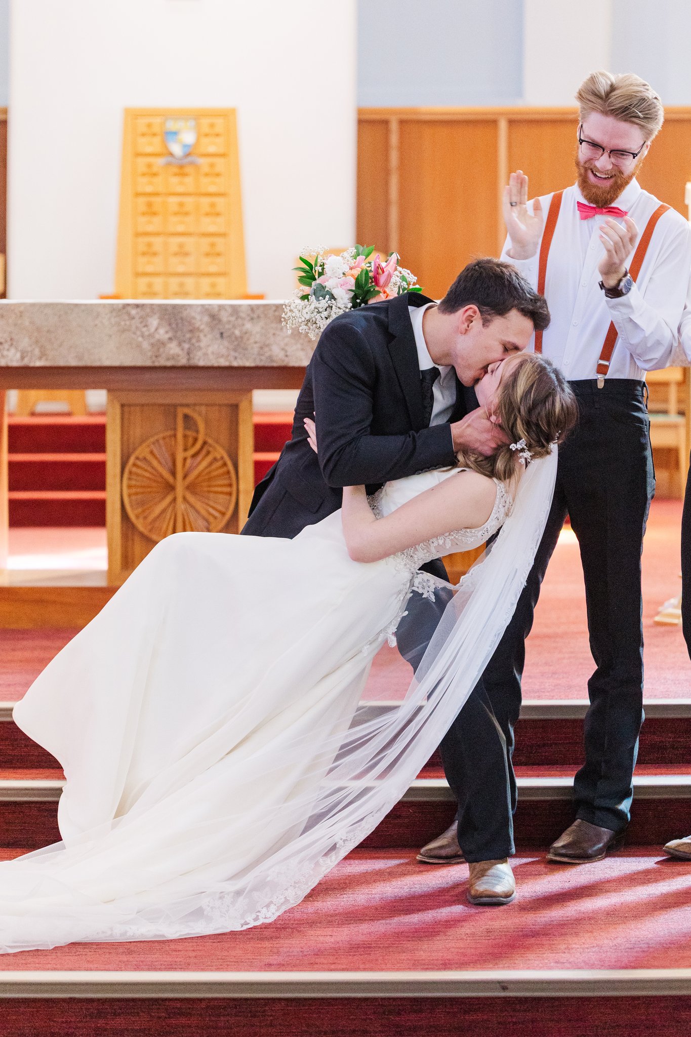 Bride and groom smiling during the recessional after ceremony
