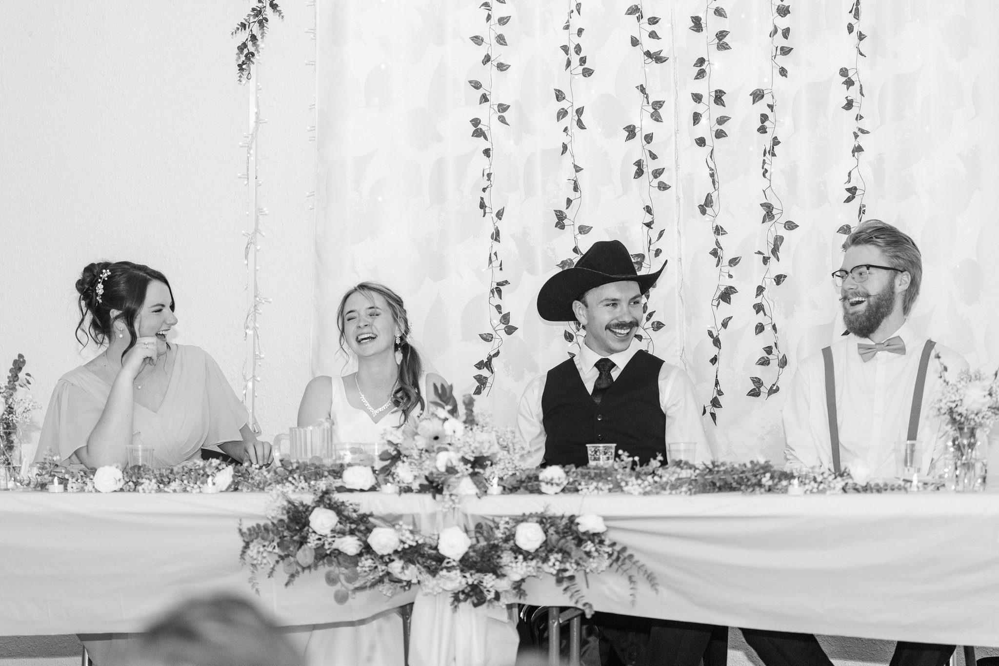 Bride and groom sharing a moment at the wedding reception