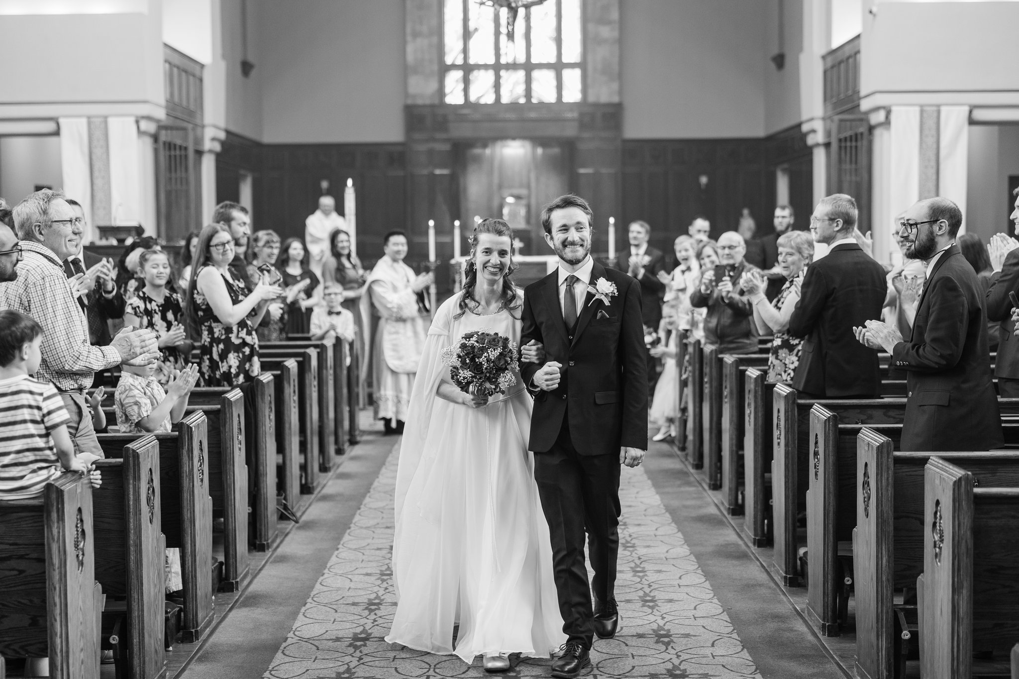 Recessional at Gabriella and Daniel's wedding at St. Mary's Cathedral Alberta