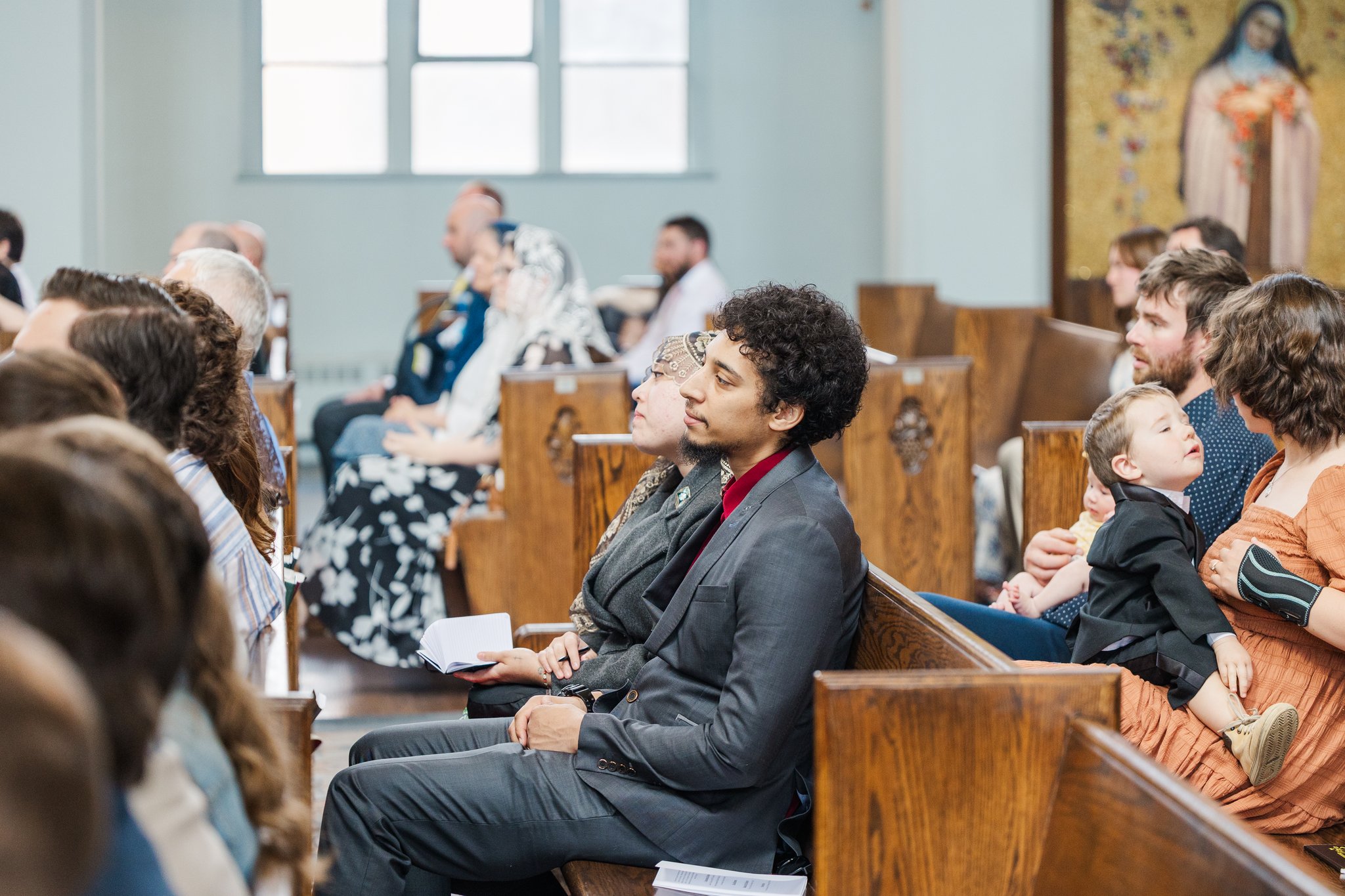 Guests watching the ceremony at St. Mary's Cathedral Alberta wedding