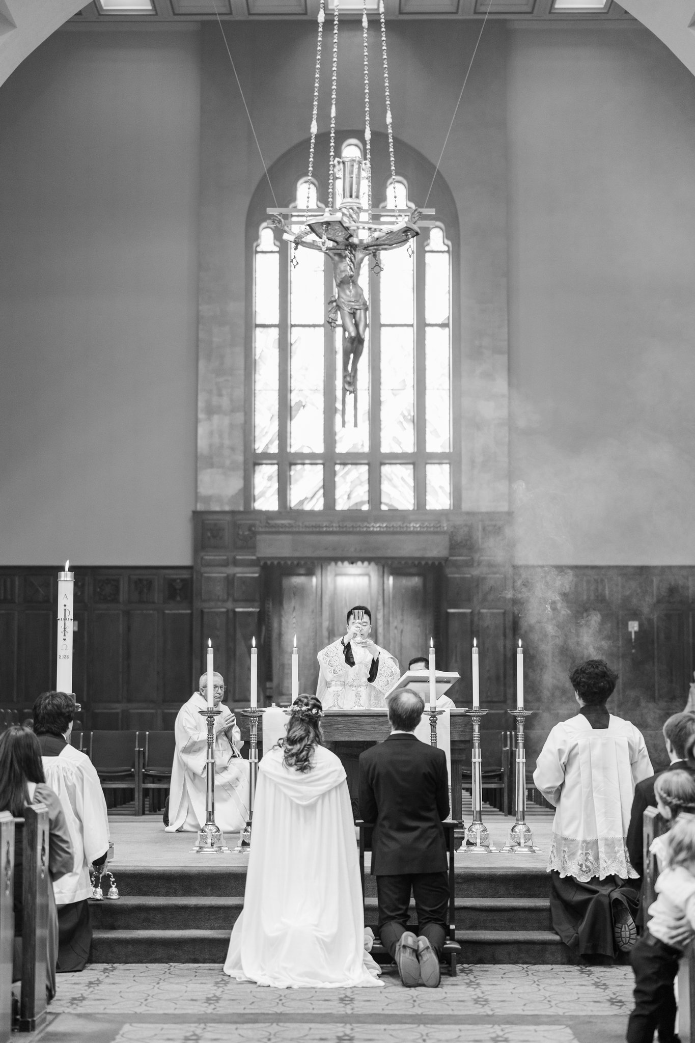 Guests celebrating at Gabriella and Daniel's recessional at St. Mary's Cathedral Alberta