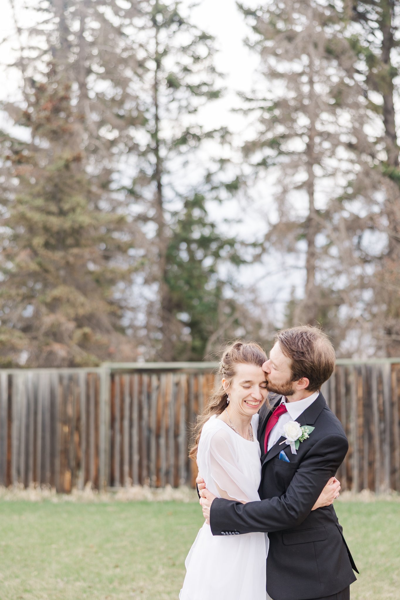 Gabriella and Daniel golden hour portrait at their Alberta spring wedding