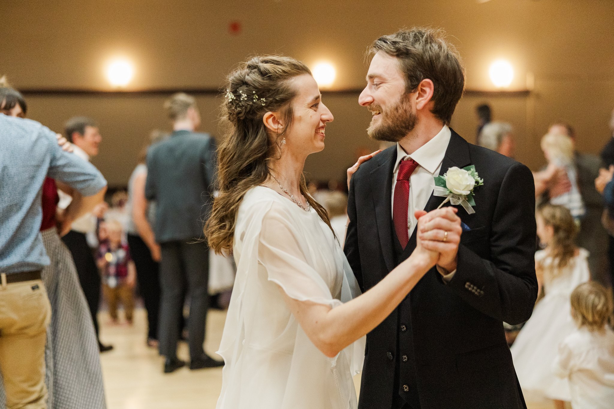Guests celebrating at Gabriella and Daniel's small town Alberta wedding reception